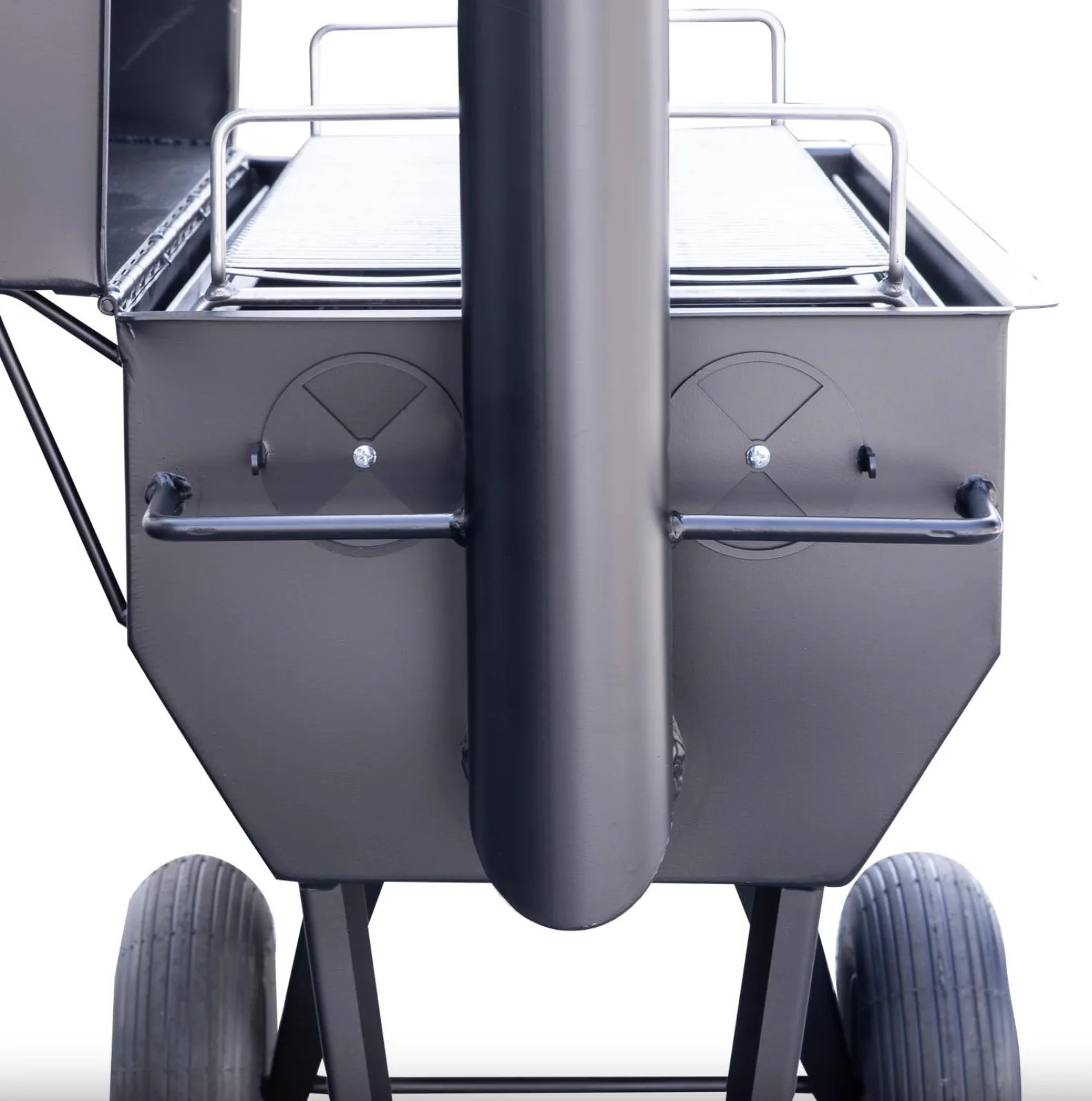 Rear view of Meadow Creek SQ36 smoker showing chimney, adjustable dampers, and wheeled frame.