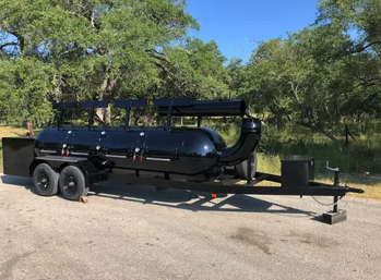 Moberg 1000 Gallon Offset Smoker on a Trailer