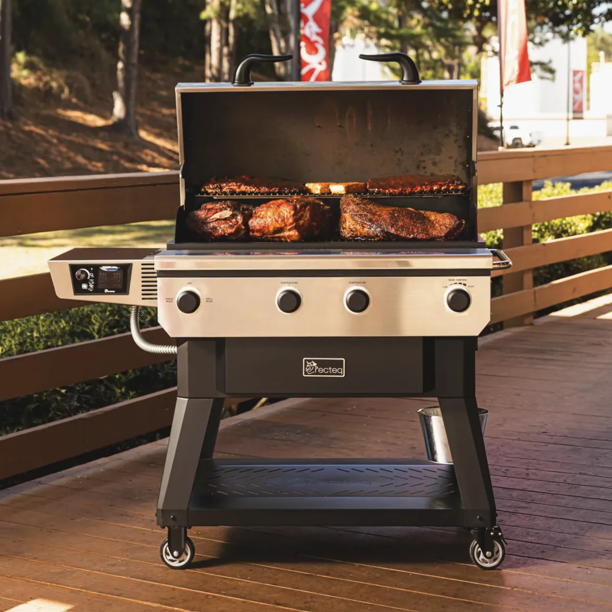 Recteq X-Fire Pro 825 Pellet Grill, smoking pork butts, brisket and ribs on a deck
