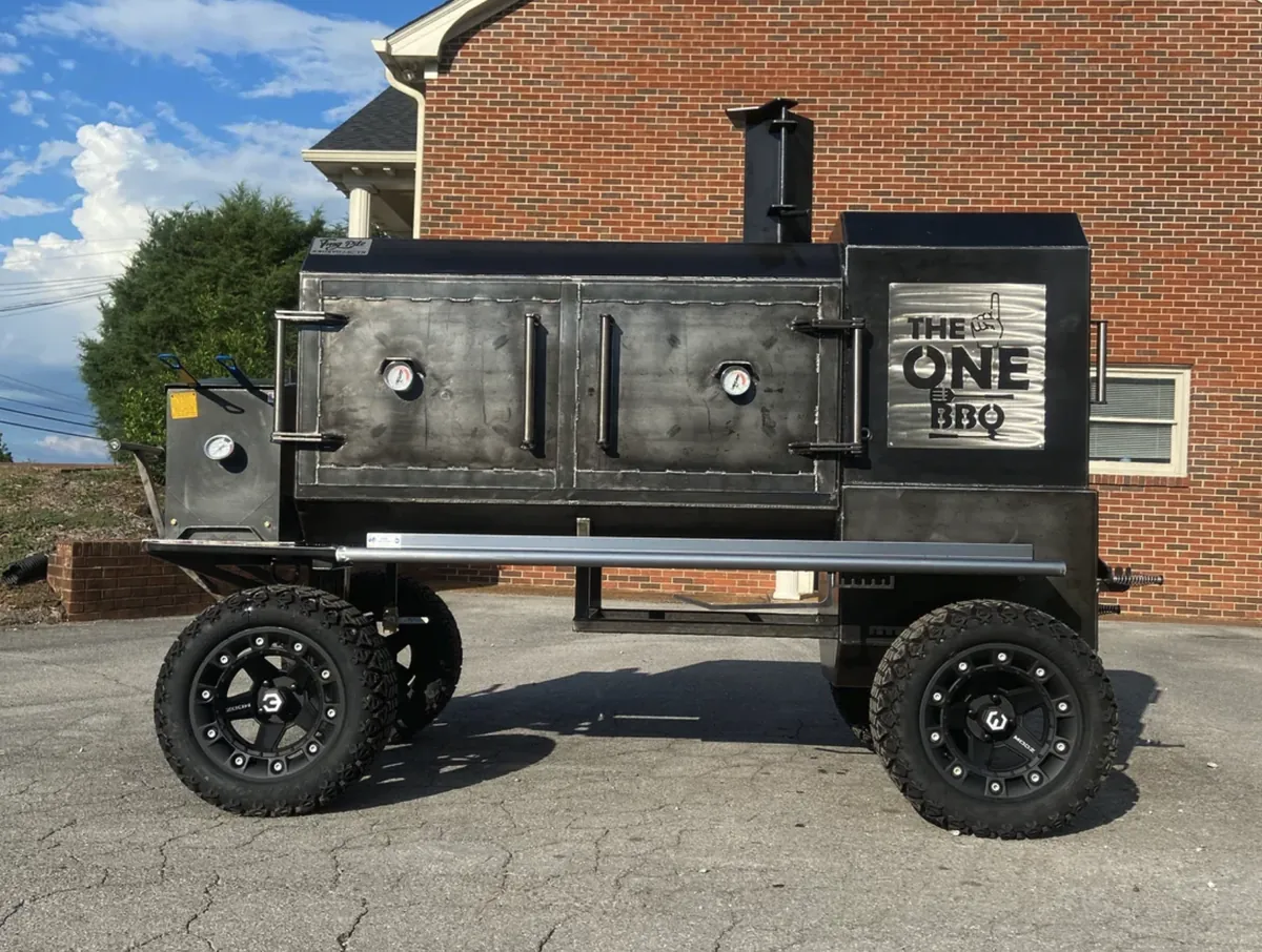 TMG Pits The Fridge Cabinet Smoker, side view with double doors and custom stainless name badge